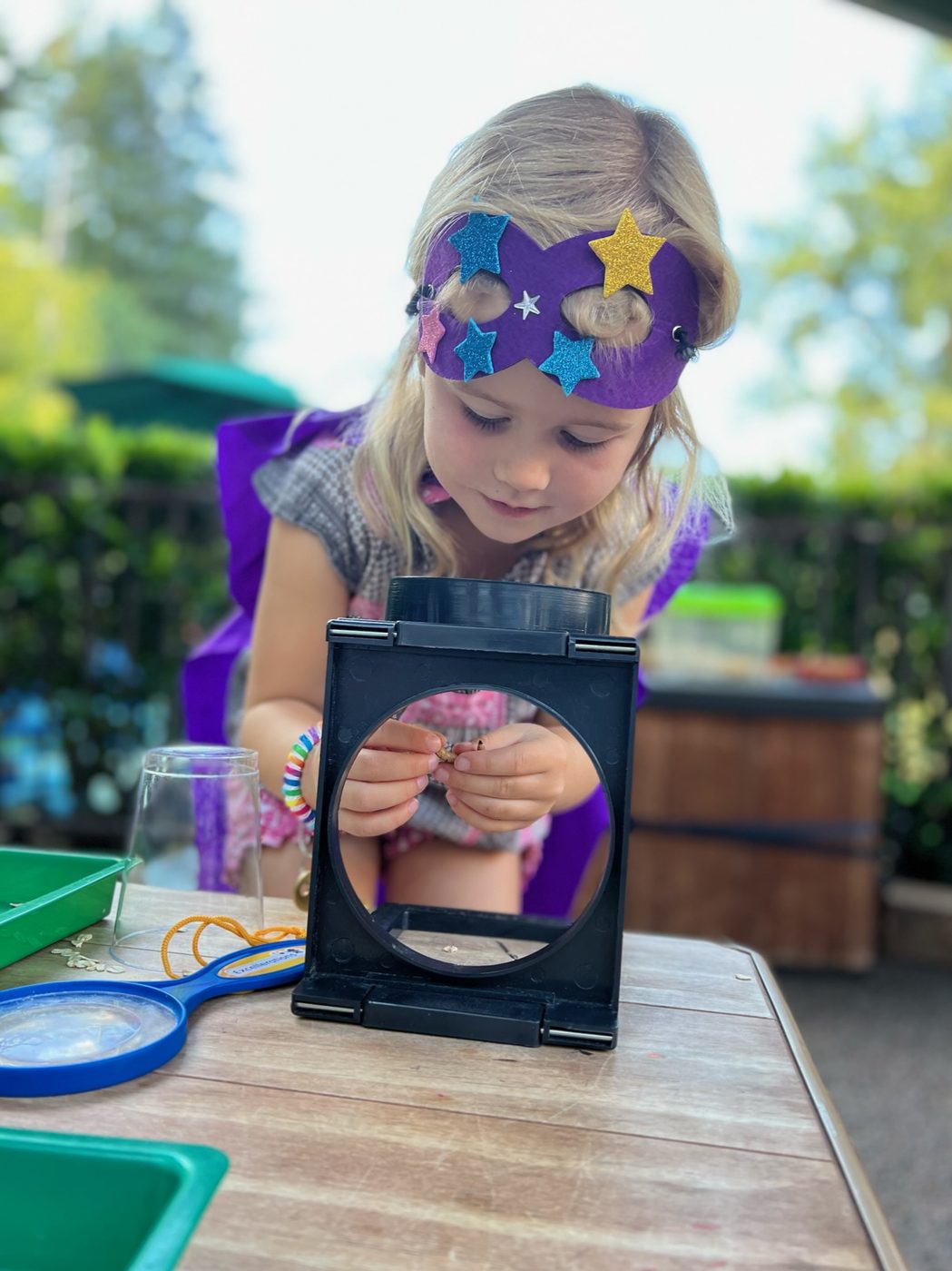 Child exploring and discovering at The Ross Preschool
